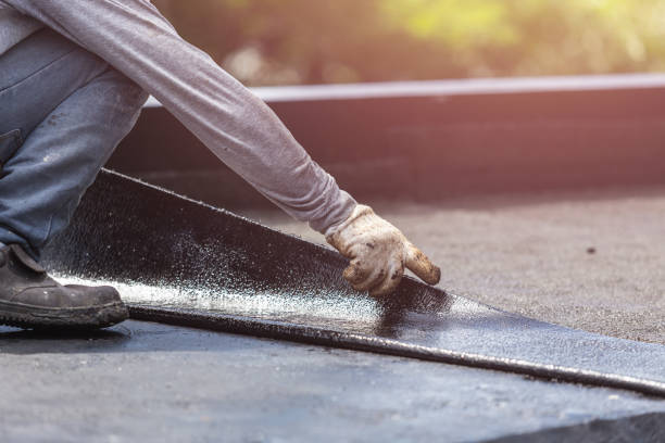 Professional Basement Waterproofing technician working in Fairview, NJ